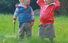 Lade das Bild in den Galerie-Viewer, Lütter Knopfrock Größe 74-164